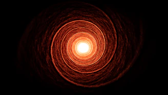 a light in the middle of a dark room