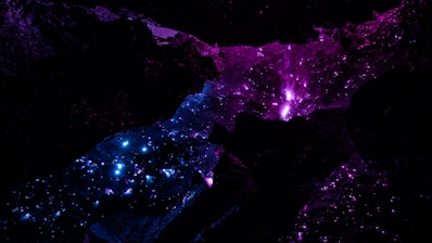 a purple and blue space filled with stars