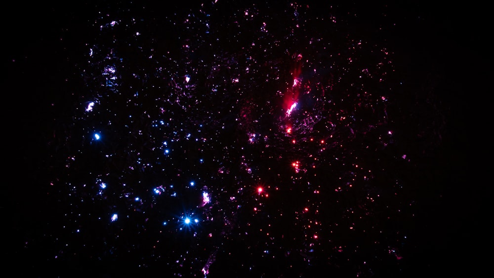 a large cluster of fireworks lit up the night sky