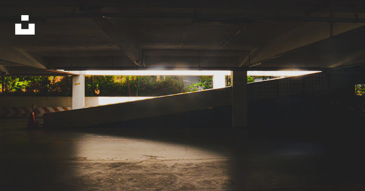 Msn Parking Ramp A parking garage with a ramp in the middle of it photo – Free Road ...