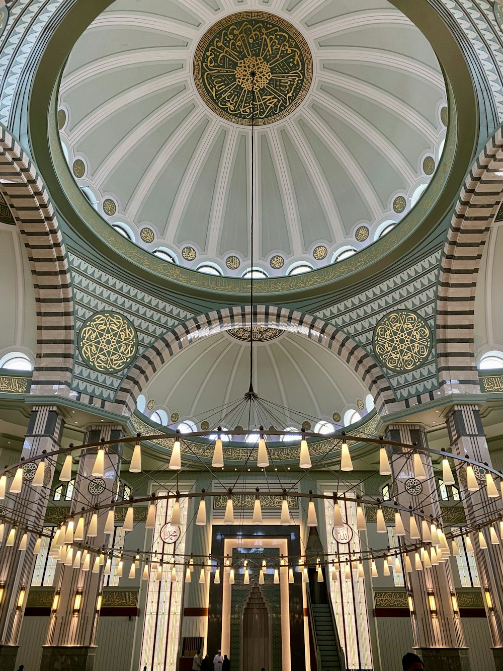 the ceiling of a large building with a domed ceiling