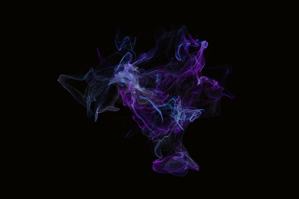 a black background with blue and purple smoke
