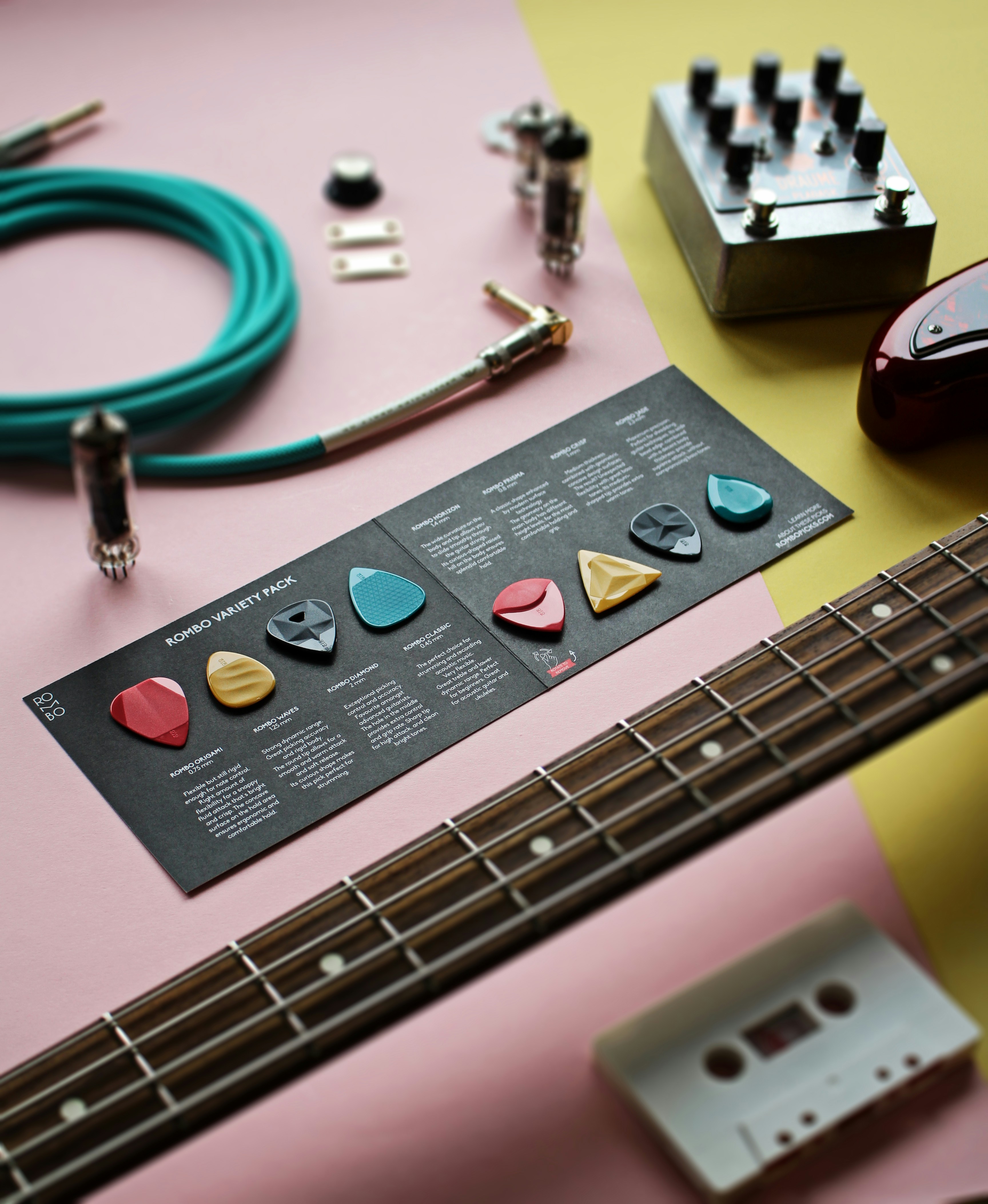 a guitar and other musical instruments on a table