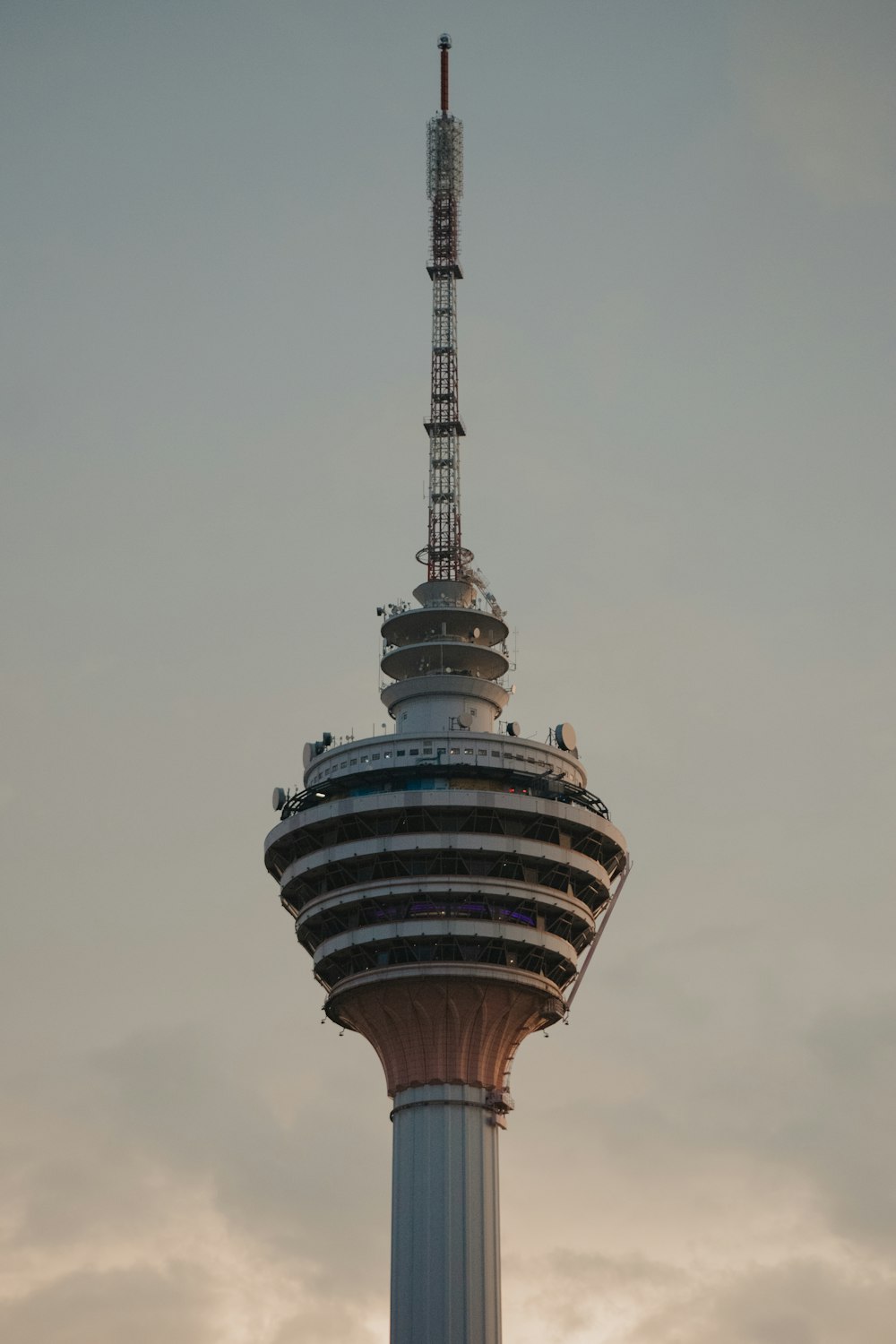 a very tall tower with a sky background