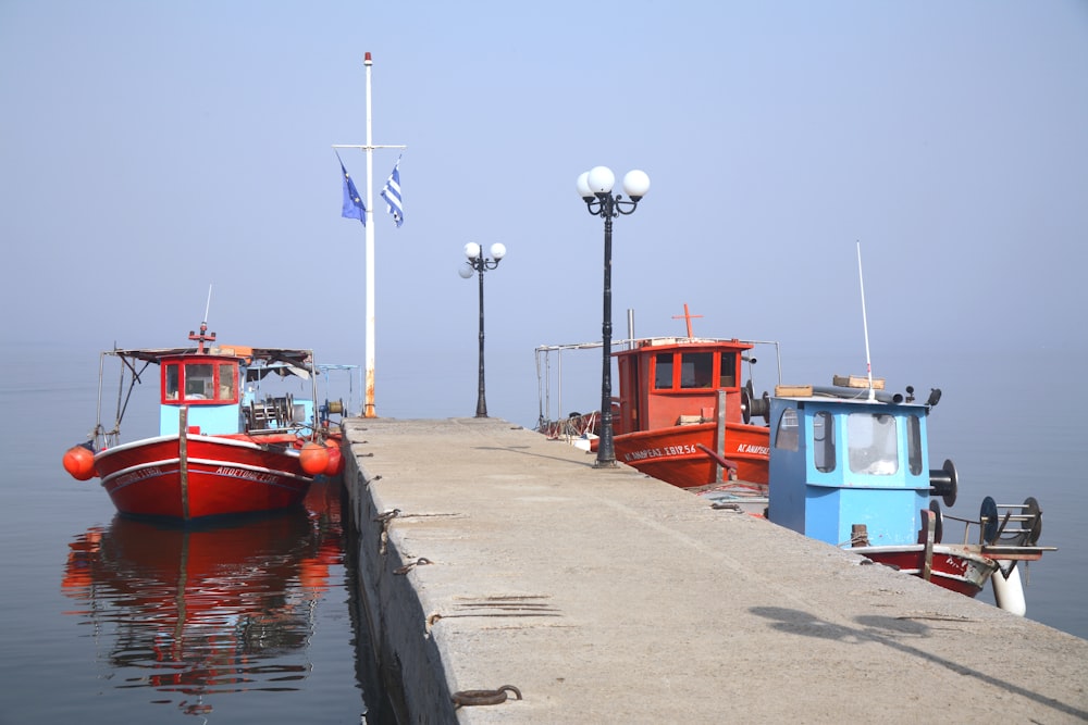 a couple of boats that are sitting in the water