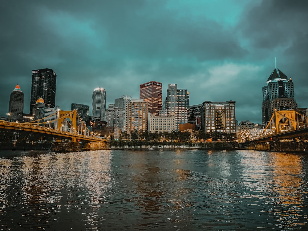 a view of a city with a bridge over the water