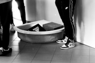 Volunteers handing out shoes to excited youth at a community center in Atlanta.