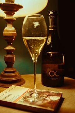 An elegant table setting featuring caviar and champagne.