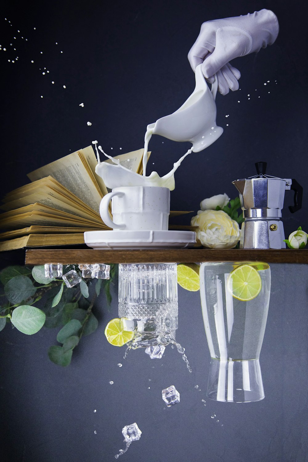 a person pouring milk into a cup on top of a table