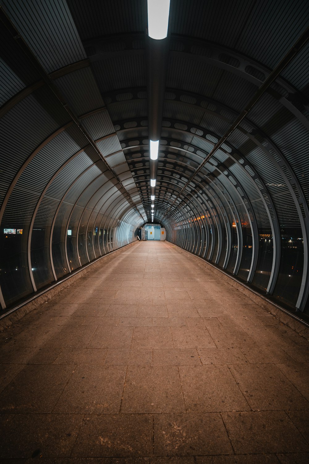 a long tunnel with a light at the end