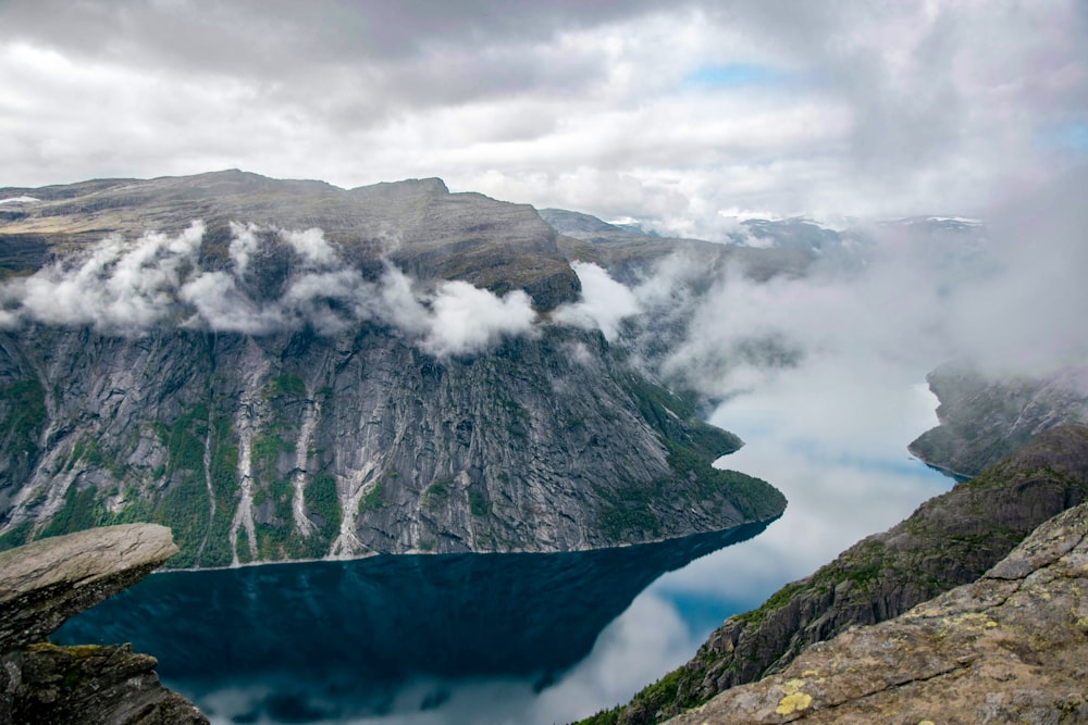 a large body of water surrounded by mountains