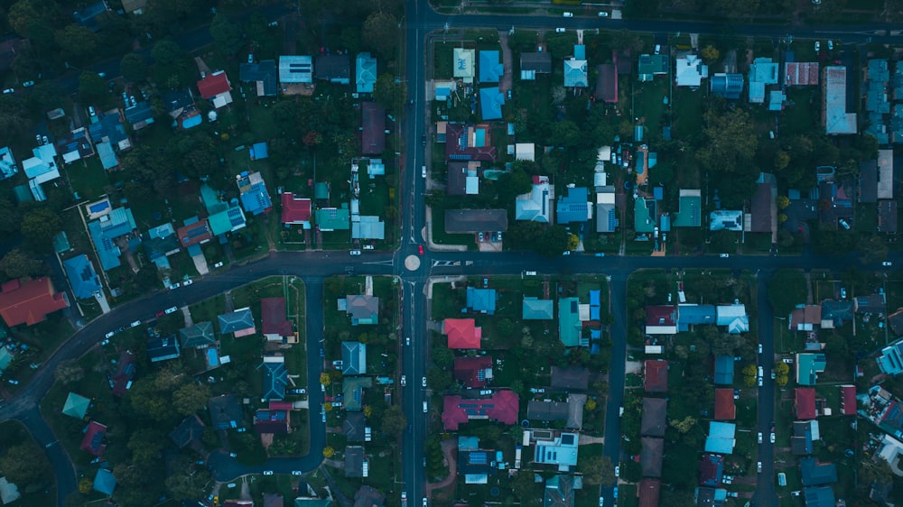 an aerial view of a city with lots of houses