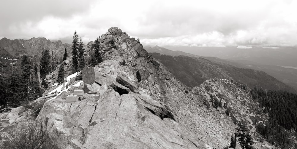 a black and white photo of the top of a mountain