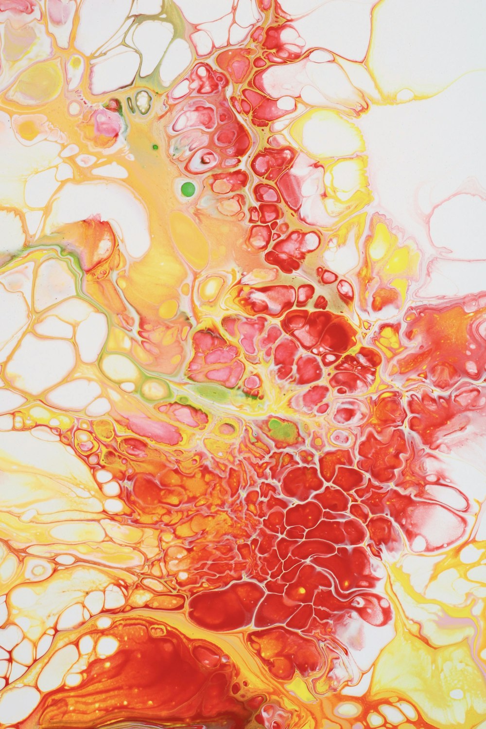an abstract painting with red, yellow, and green colors