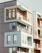a tall building with balconies and balconies on the balconies