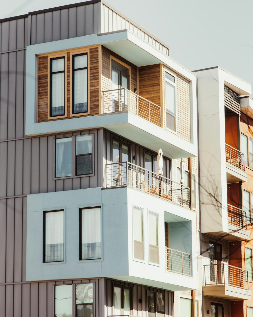 a tall building with balconies and balconies on the balconies