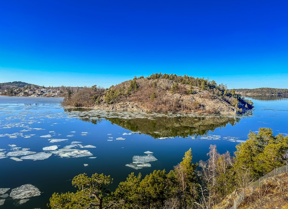 a small island in the middle of a lake