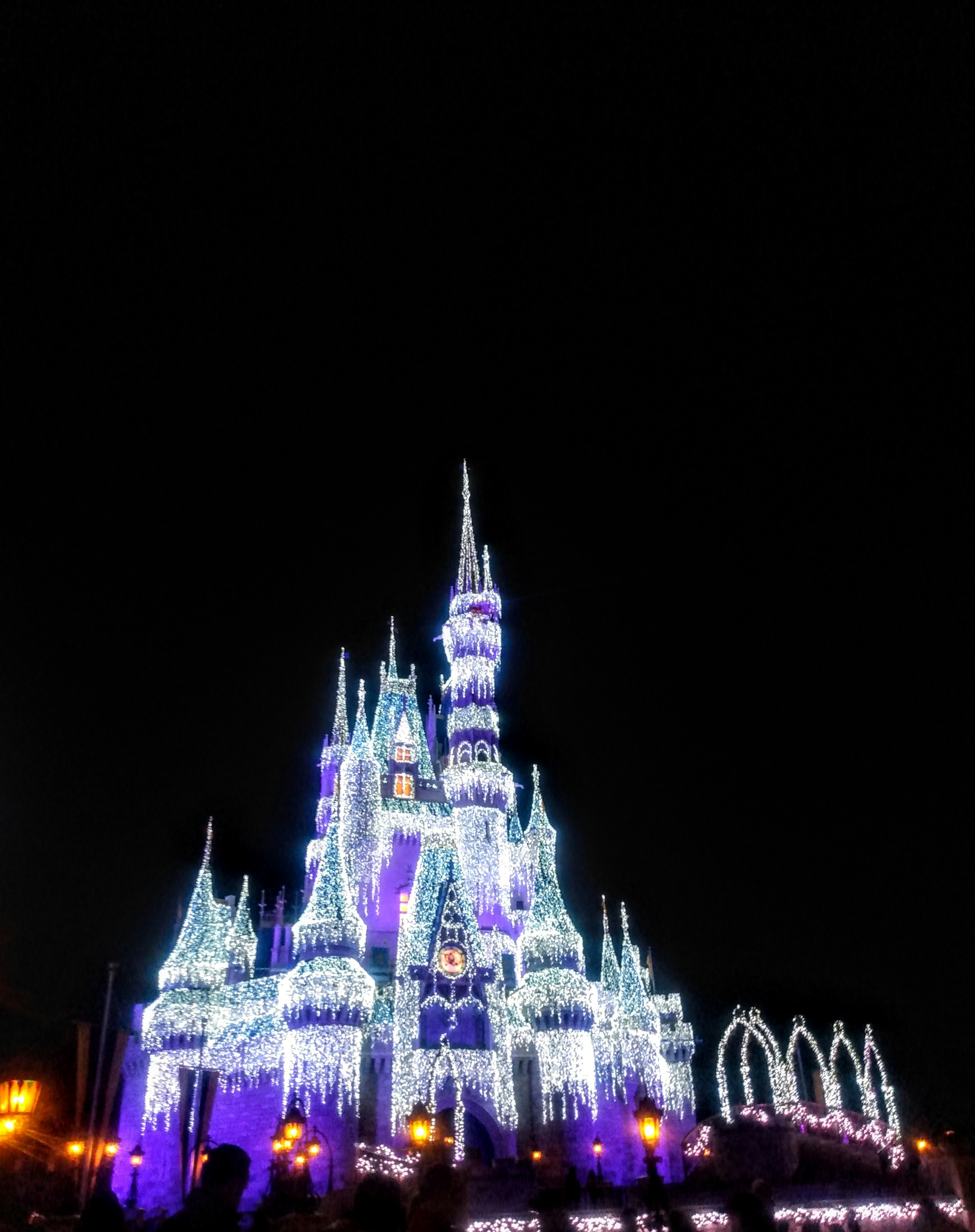Cinderella castle in Walt Disney world at night featured photo