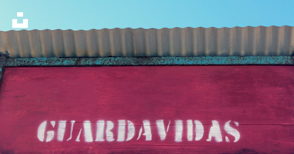 Guarda Sign A red sign that says guardaddas on it photo – Free My office Image on ...