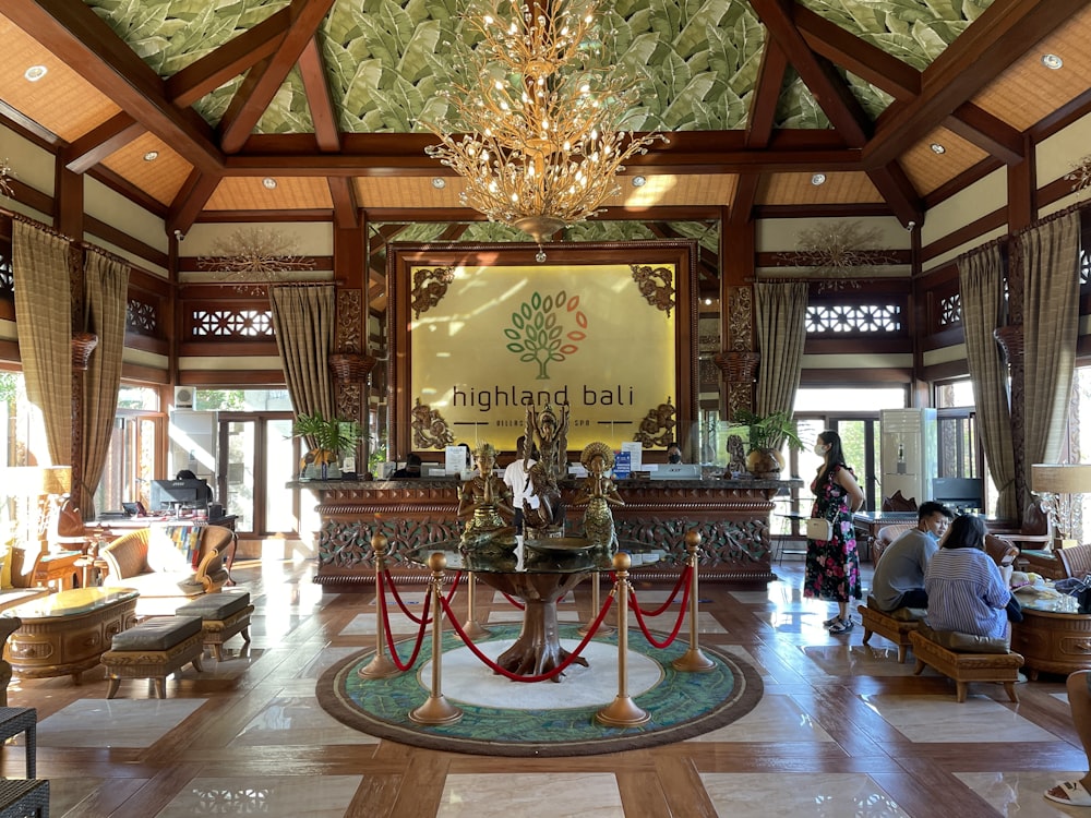 a large room with a chandelier hanging from the ceiling