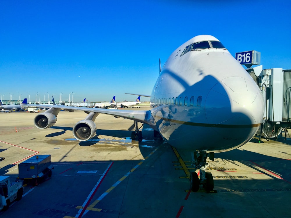 a large jetliner sitting on top of an airport tarmac