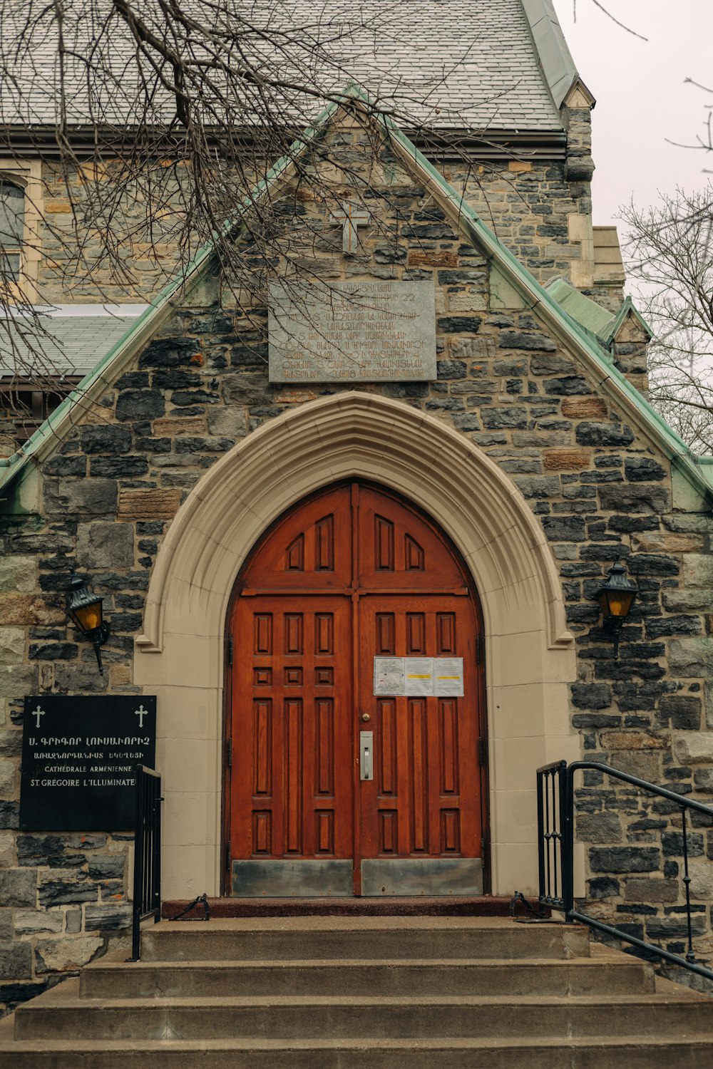 a church with a red door and a steeple