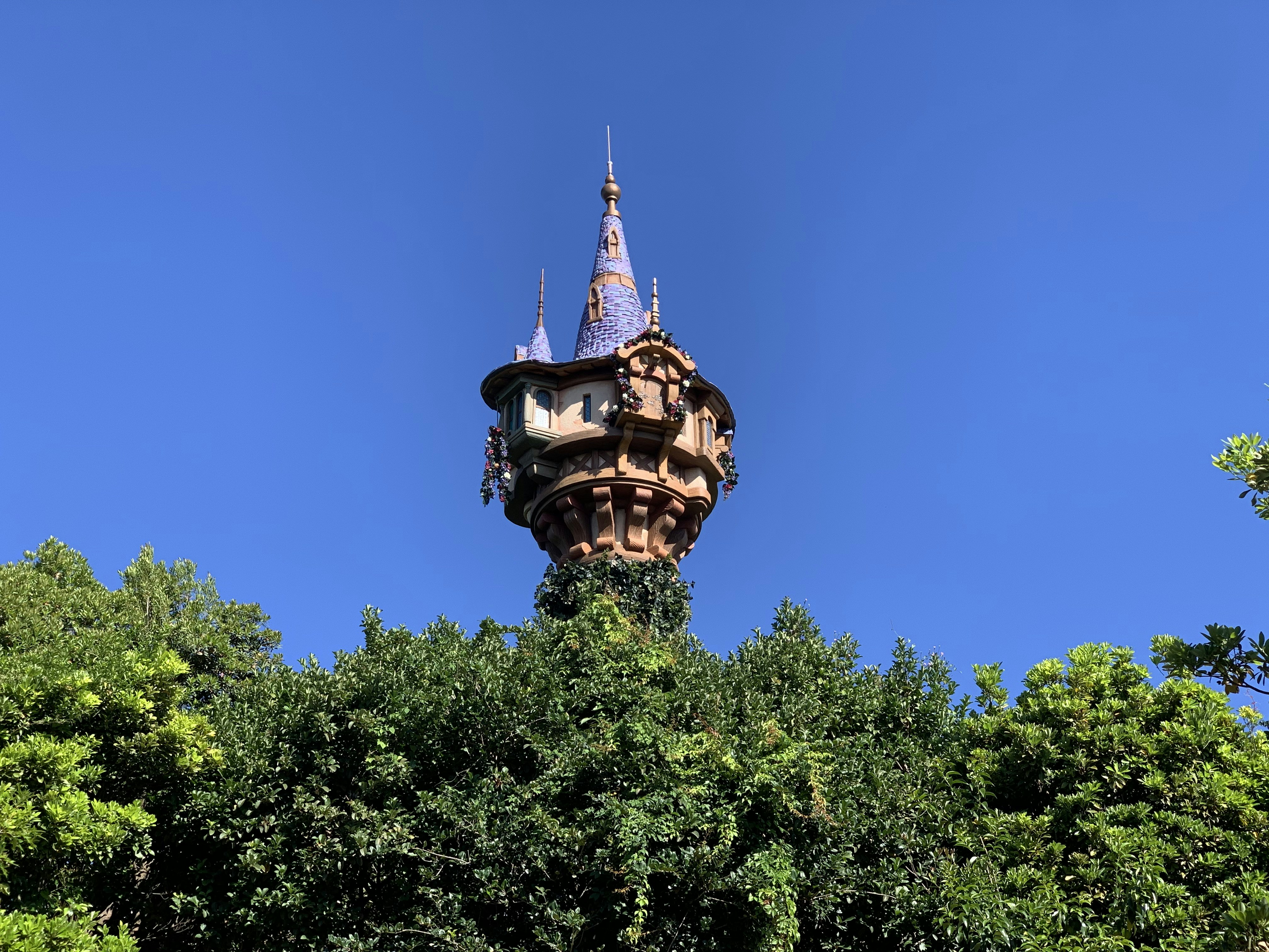 a tall tower with a clock on top of it