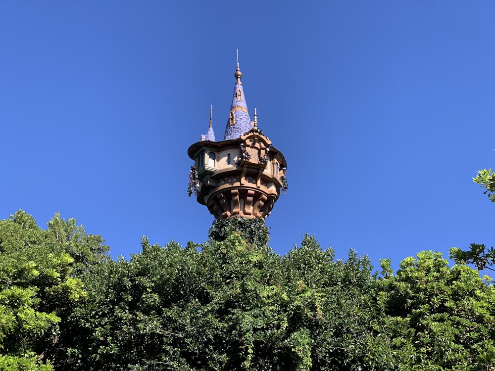 a tall tower with a clock on top of it