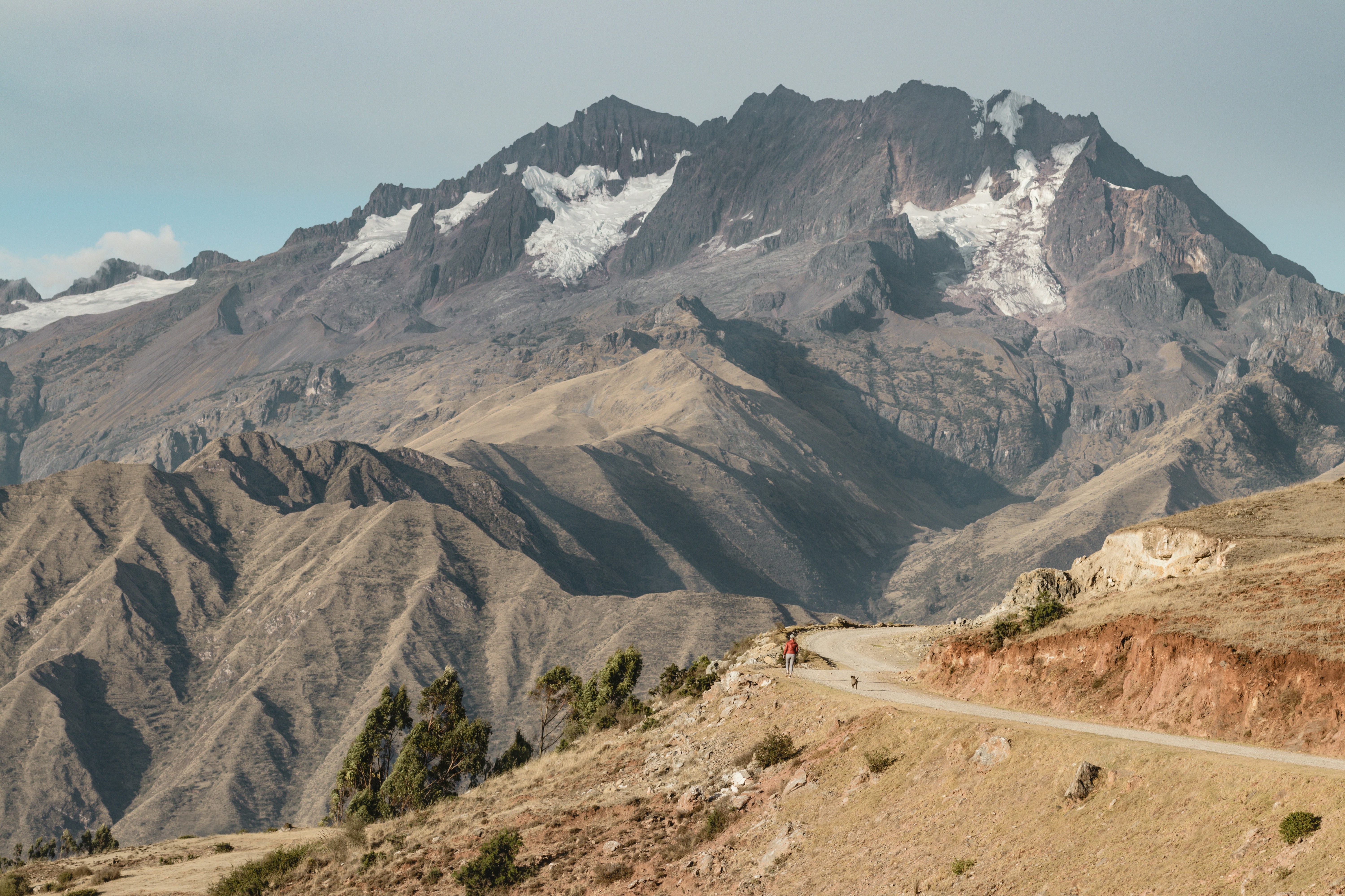 a mountain range with a road going through it