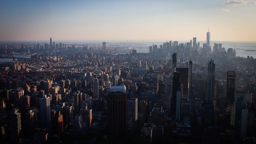 an aerial view of a city with tall buildings