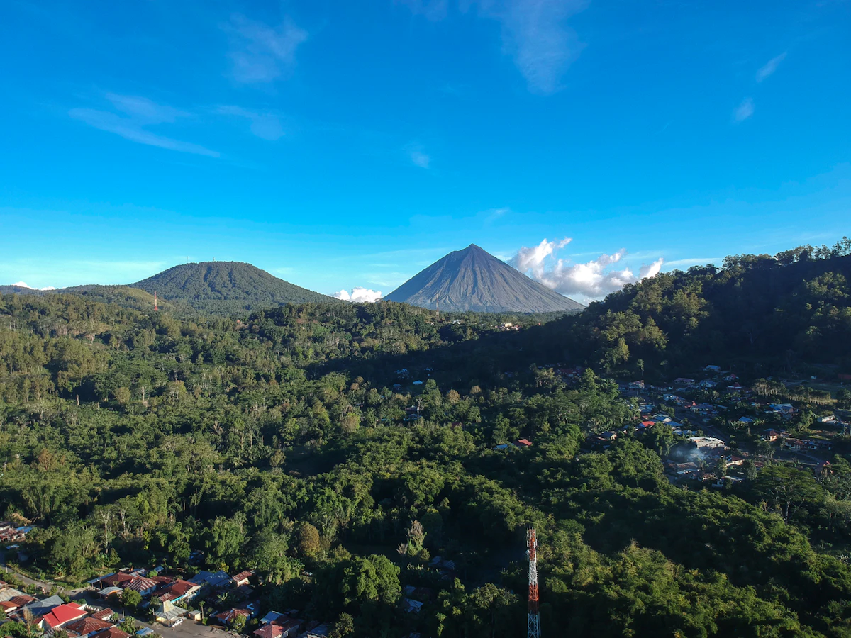 Three colored volcanic crater lakes atop Mount Kelimutu in Flores
