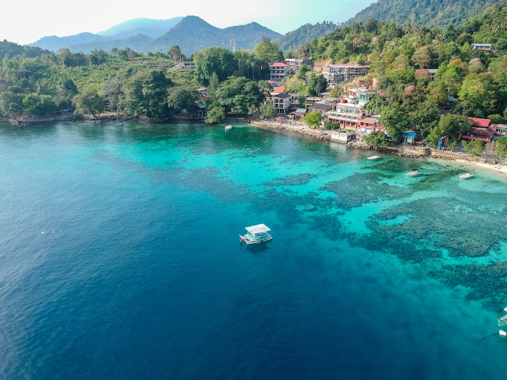 a boat floating on top of a body of water