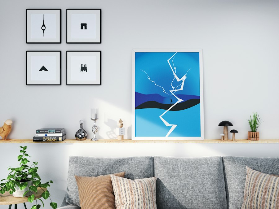 Phòng khách với sofa và mảng tường trang trí tông xanh - phối màu nhà mệnh Thủy