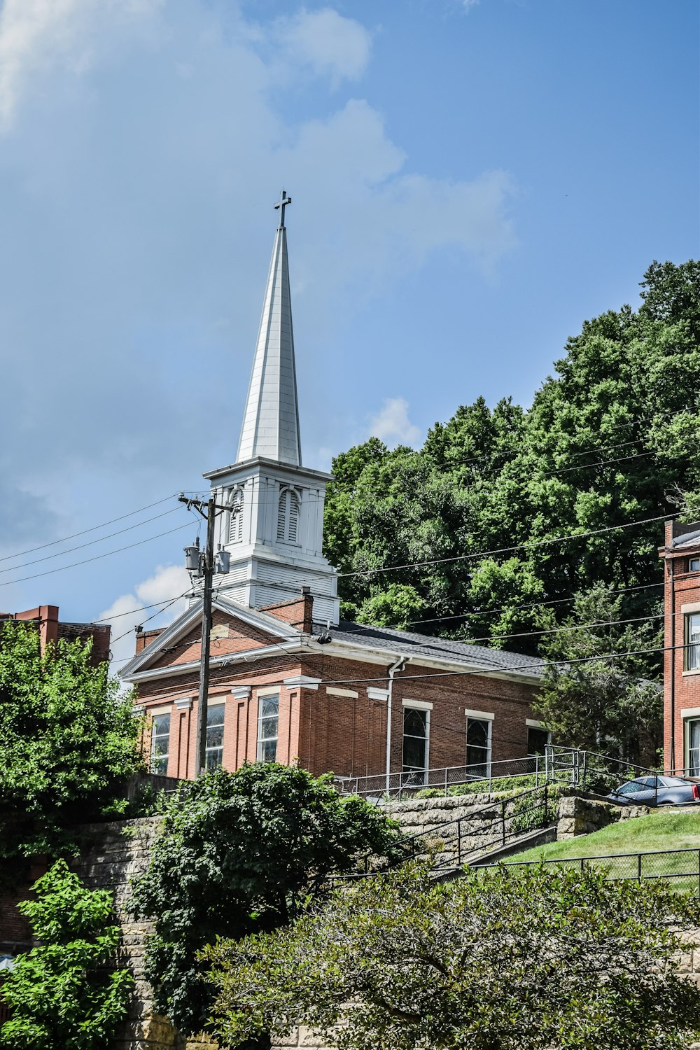 a church with a steeple on top of it