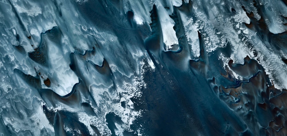an aerial view of ice and water from a plane