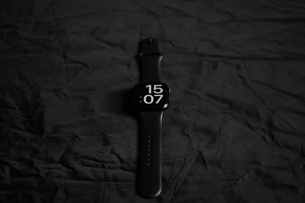 a black and white photo of an apple watch