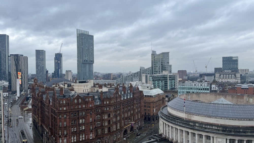 a view of a city with tall buildings