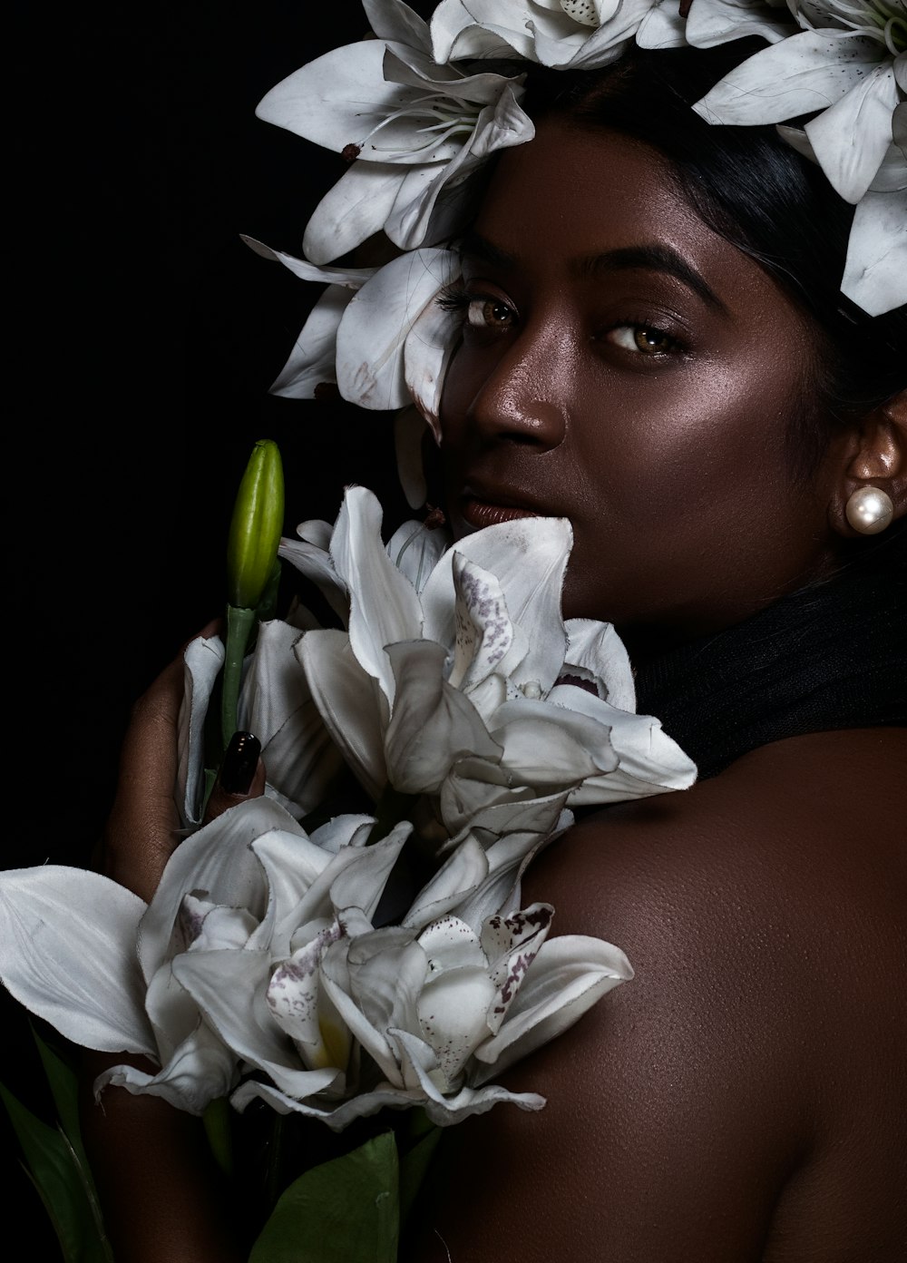 a woman with a flower crown on her head