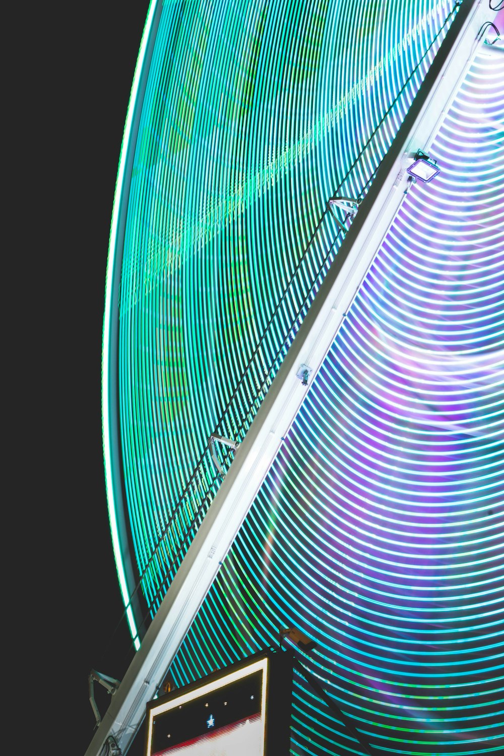 a close up of a clock with a sky background