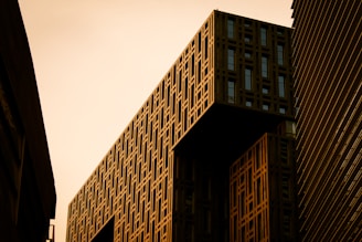a very tall building next to a very tall building
