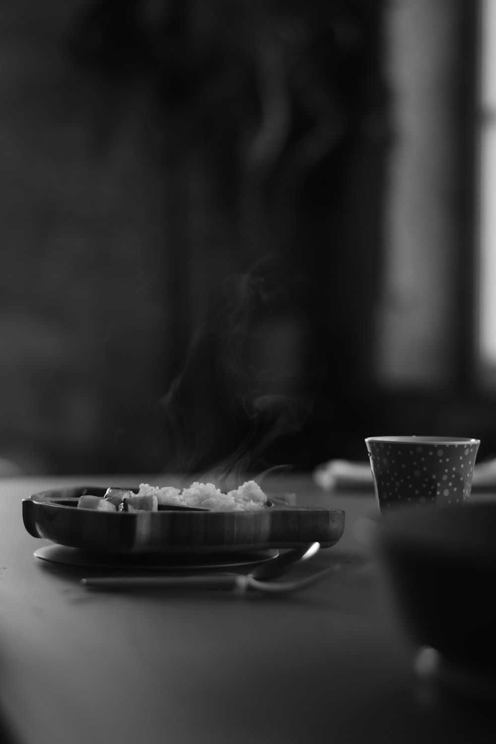 a black and white photo of food on a table