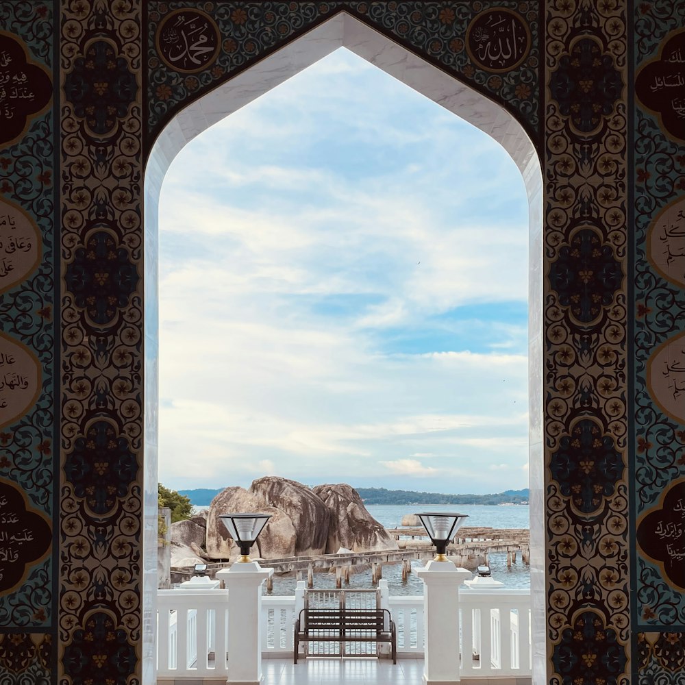 a room with a view of a body of water