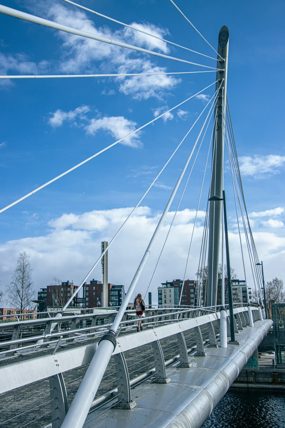 a view of a bridge over a body of water