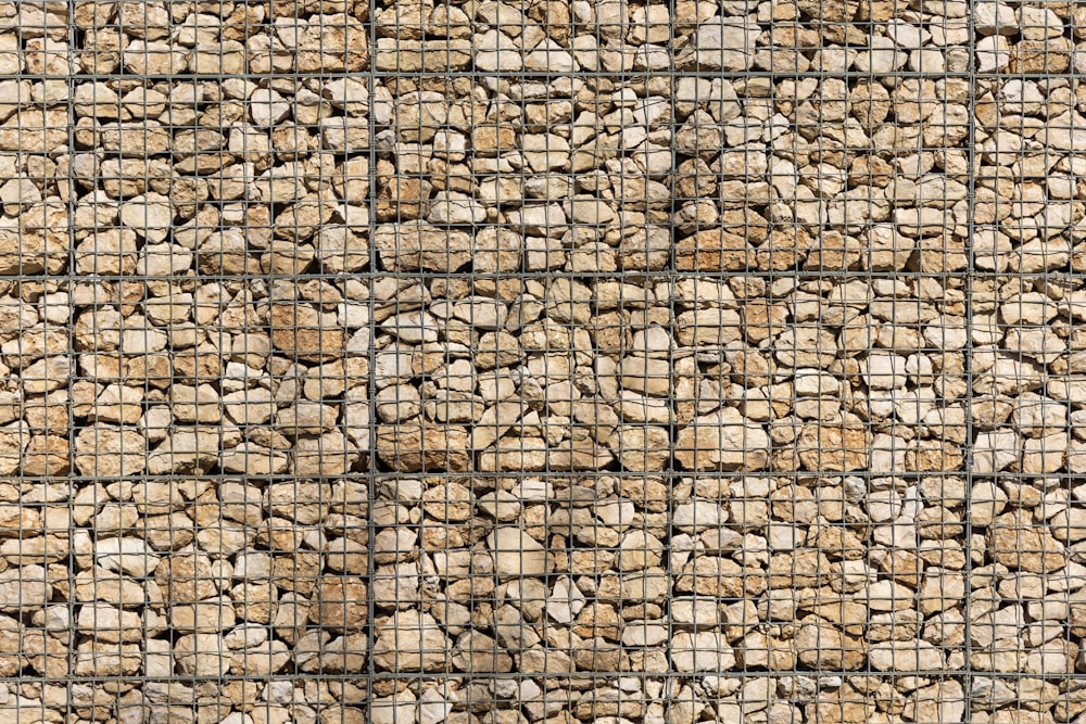 a close up of a wall made of rocks