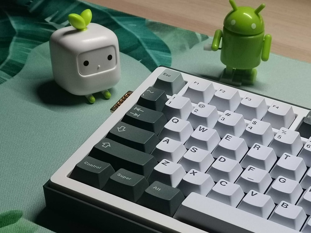 a computer keyboard sitting on top of a table