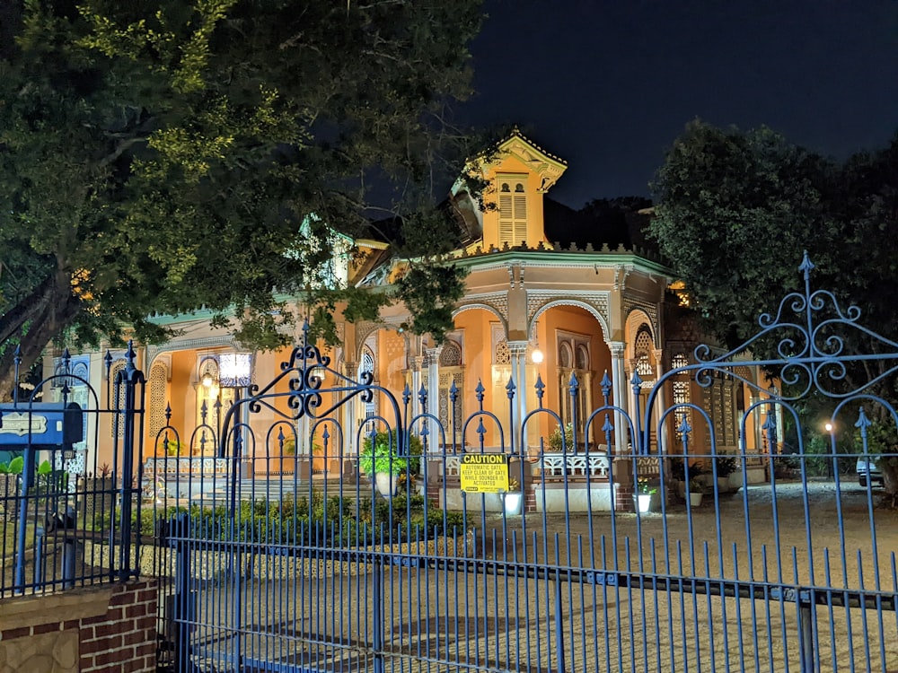 a building with a clock tower lit up at night