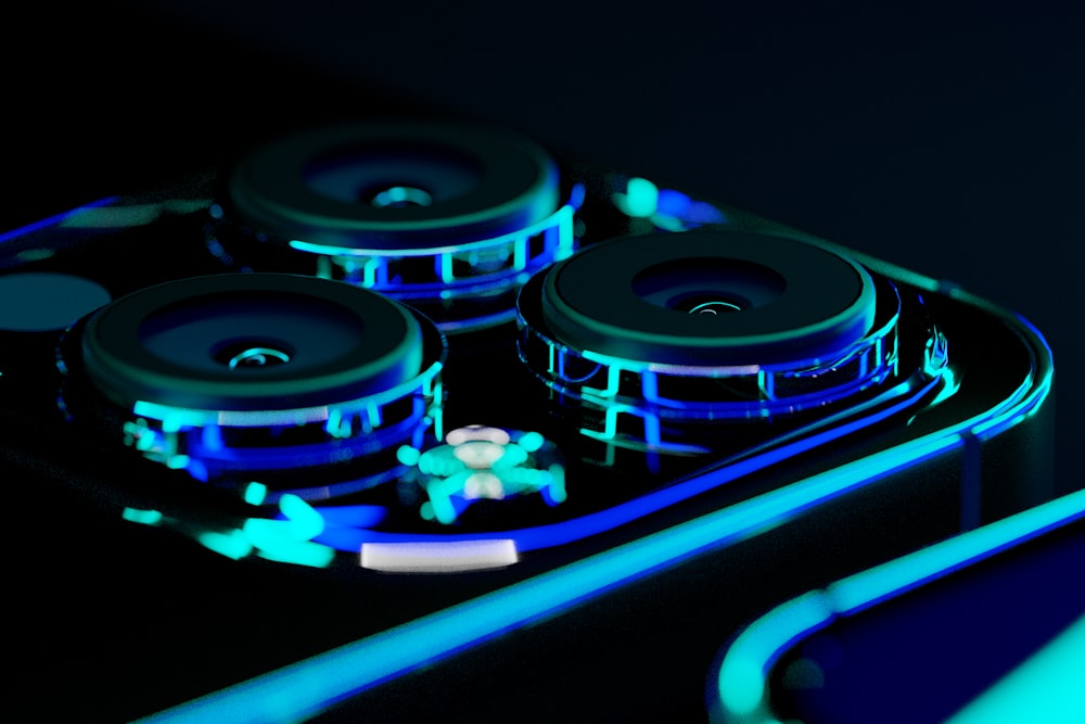 a close up of a cell phone with blue lights