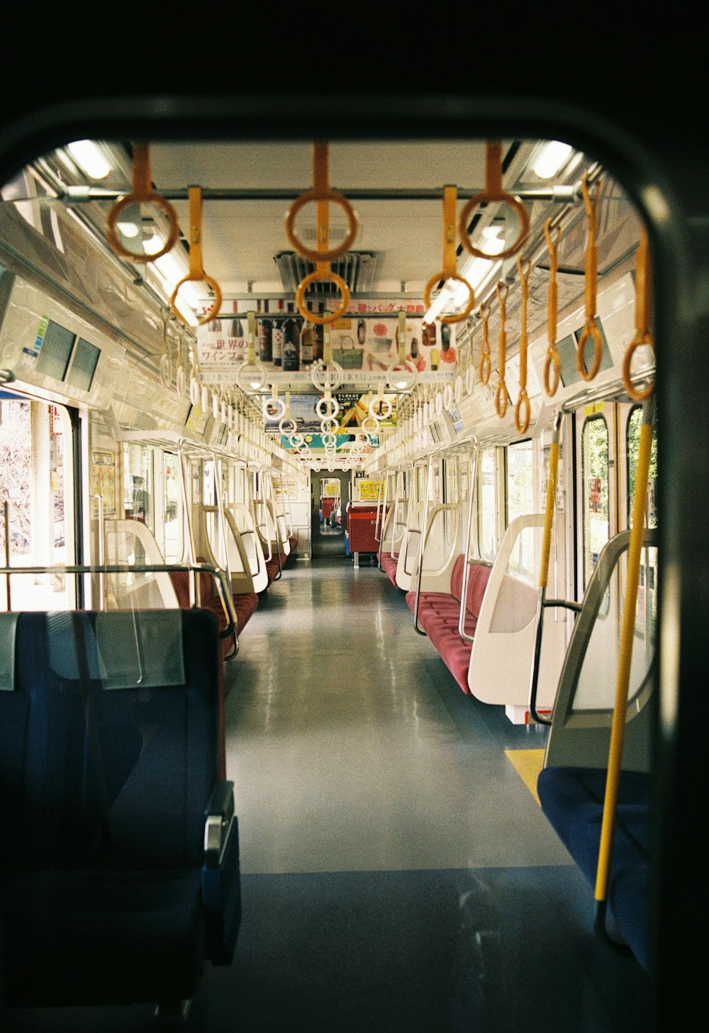 a view of the inside of a subway car