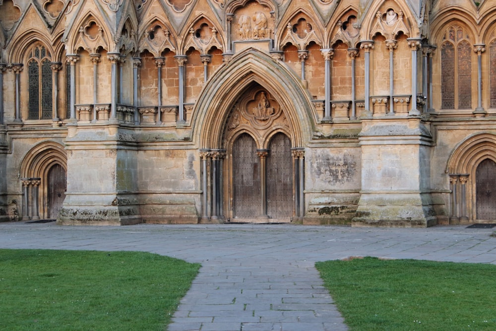 a large building with a stone walkway in front of it