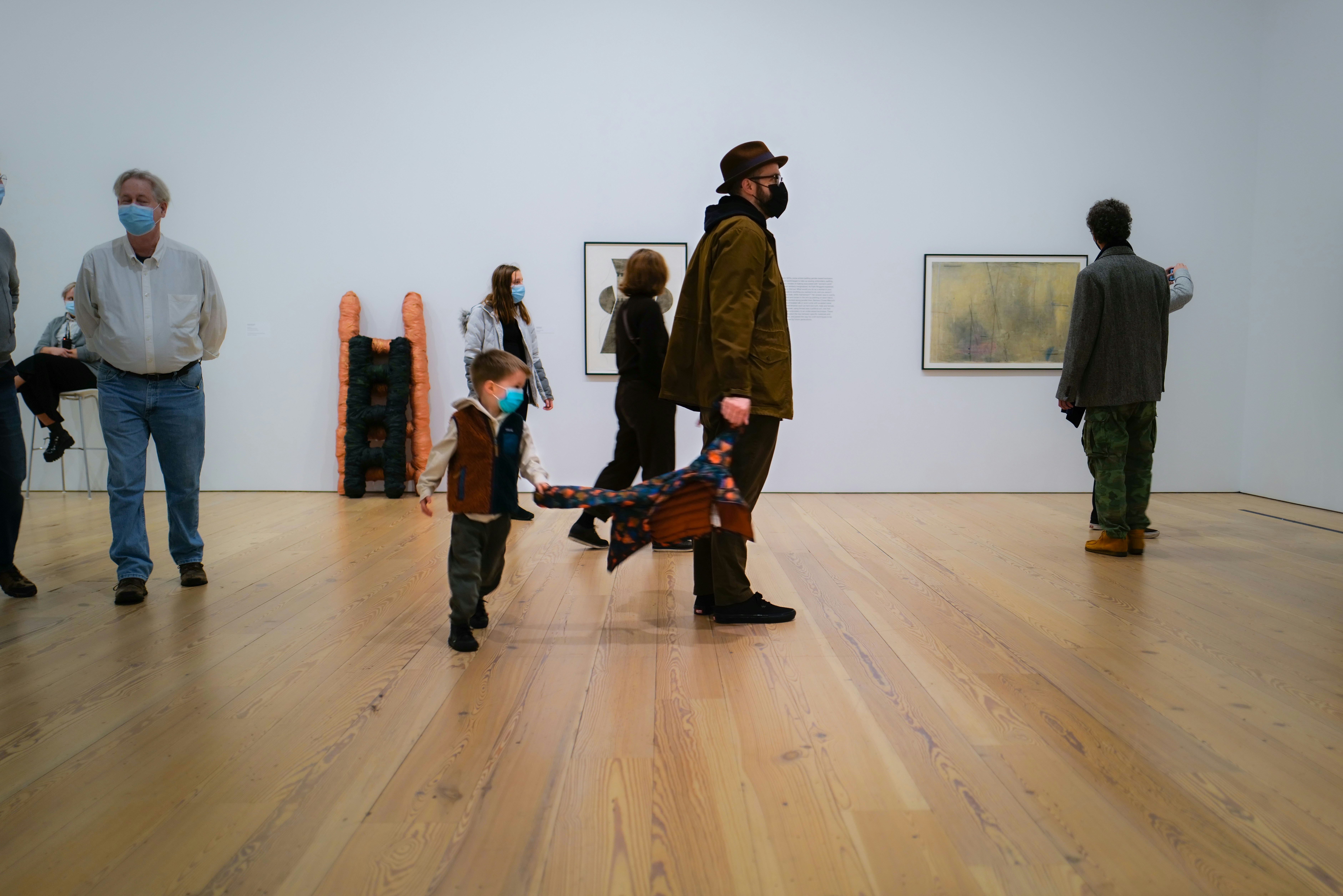 a group of people standing in a room